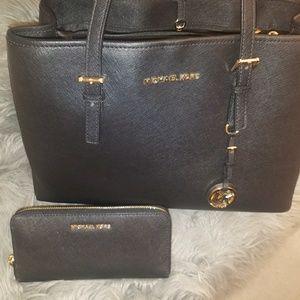 MK large Jet Set Traveler bag and wallet set.